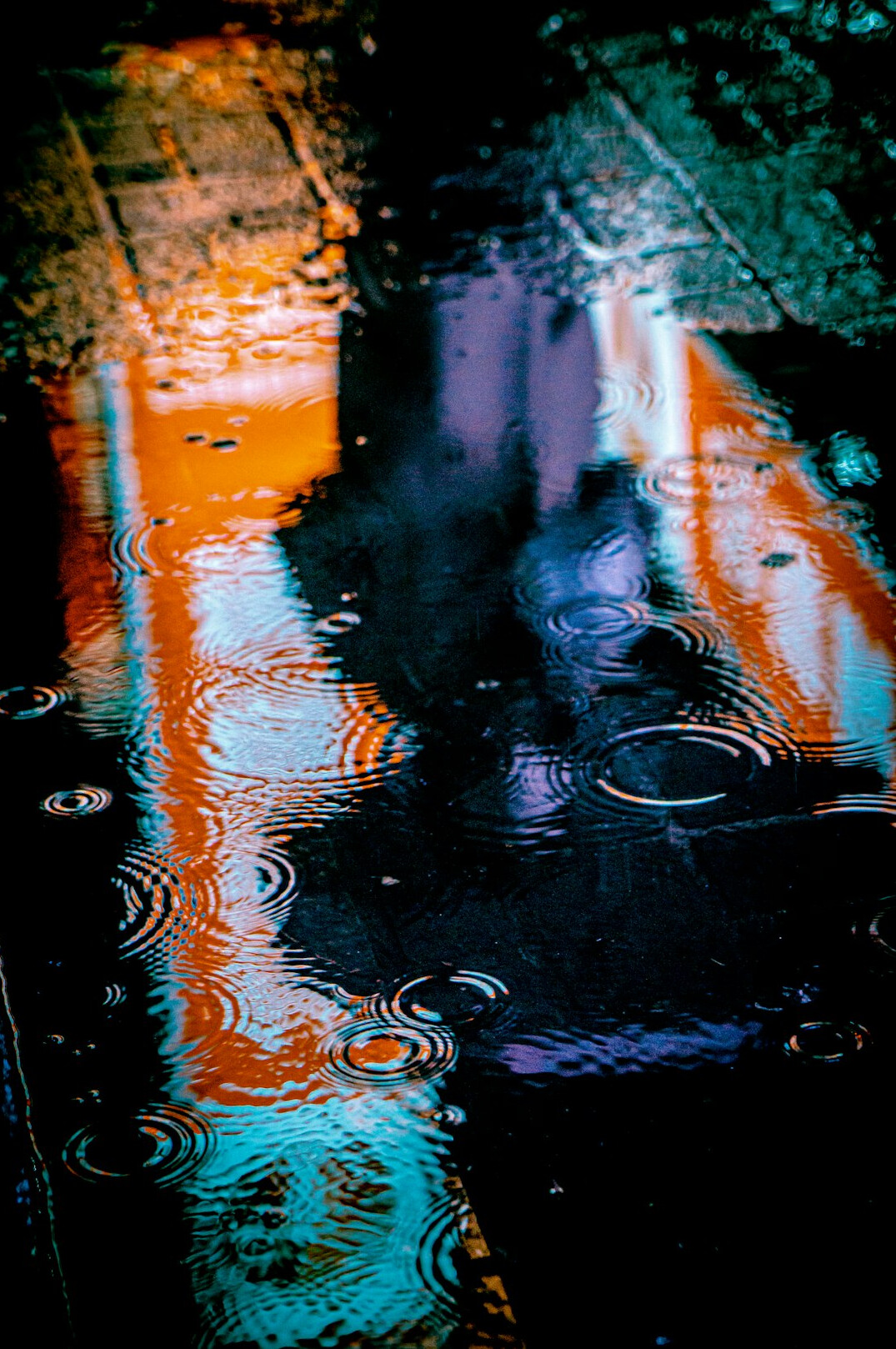 rainy street at night with shadows
