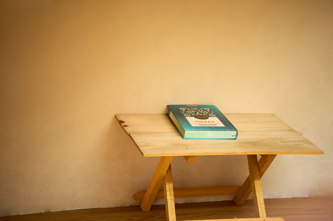 old book manuscript on wooden table